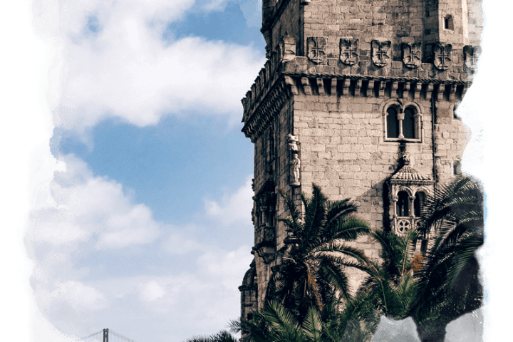 a castle with a clock tower on a cloudy day