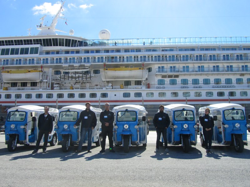 a group of people standing in front of a building